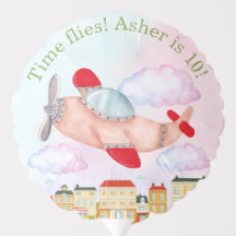 Vintage Airplane with Pastel Clouds and Cityscape