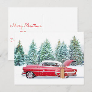 Vintage-auto met vrolijk kerstfeest in de winter m feestdagenkaart