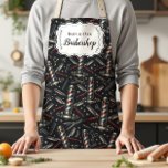 Vintage Barbershop Tools Pattern Schort<br><div class="desc">A bold vintage barbershop design featuring a classic pattern of barber poles, scissors, razors, combs, and grooming tools set against a deep charcoal background. The detailed illustration style creates a timeless barbershop aesthetic with subtle red, blue, and metallic accents that instantly evoke traditional grooming culture. At the center, a refined...</div>