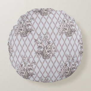 Vintage bloemenkussen in zachte blauwe tint rond kussen