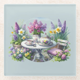 Vintage bloemthee in de tuin glazen onderzetter