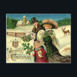 Vintage Christmas postcard Feestdagenkaart<br><div class="desc">This is a gorgeous vintage Christmas postcard of an elegantly dressed young family on their way to church. The father is in a black coat with brown fur and is wearing a smart tall hat. The mother is dressed in a green coat and large hat with feathers. Both are carrying...</div>