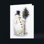 Vintage Christmas Snowman Kaart<br><div class="desc">Deze prachtige kerstkaart is voorzien van een illustratie van een vrolijke kleine sneeuwman met een zelfgemaakte kerstboom vol feestelijke kerstballen. Hij heeft een pijp in zijn mond en hij draagt een zwarte hoed onder een schuchtere hoek. De voorkant van de lachende sneeuwman is versierd met vrolijk rode knopen. Het originele...</div>