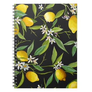 Vintage citroenvruchten en bloemen op donkere onde notitieboek