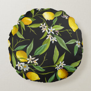 Vintage citroenvruchten en bloemen op donkere onde rond kussen