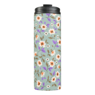 Vintage floral background. Floral pattern with sma Thermosbeker