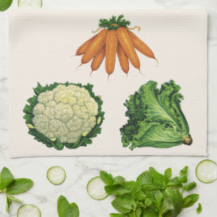 Vintage groenten; wortelen, bloemkool, sla theedoek