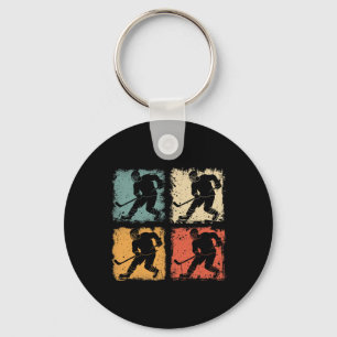 Vintage ijshockeyspeler klik retro stijl grafisch sleutelhanger