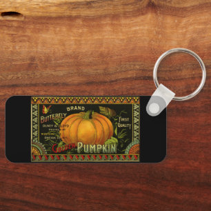 Vintage kan kunst labelen, vlinderpompoen sleutelhanger