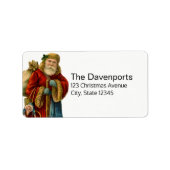 Vintage-kerstkerstbejaarde wereldkerstbedekking etiket (Voorkant)