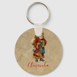 Vintage-kerstkerstbejaarde wereldkerstbedekking sleutelhanger