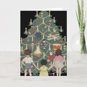 Vintage kerstkinderen rond een gedecorreerde boom feestdagen kaart