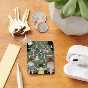 Vintage kerstkinderen rond een gedecorreerde boom sleutelhanger