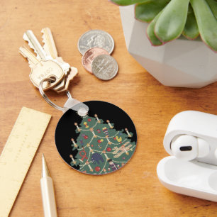 Vintage kerstkinderen rond een gedecorreerde boom sleutelhanger