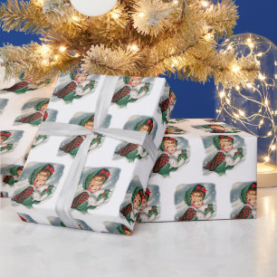 Vintage kerstmeisje Holding Holly Cadeaupapier