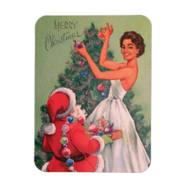 Vintage-kerstmeisje uit de jaren '50, die de boom  magneet