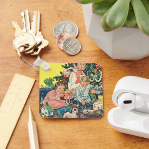 Vintage kerstochtend, kinderen openen cadeautjes sleutelhanger