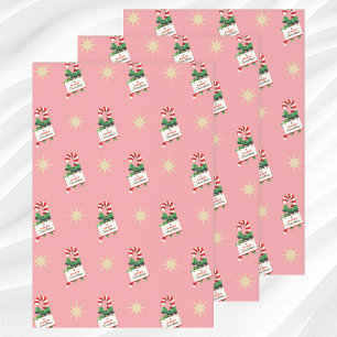 Vintage-kerstpatroon, snoeprietjes met roze inpakpapier vel