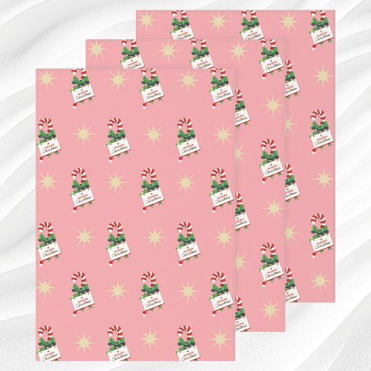 Vintage-kerstpatroon, snoeprietjes met roze inpakpapier vel