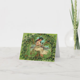 Vintage meisje met klavertjes kaart
