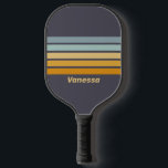 Vintage Retrograde Regenboog Dwars Strepen | Naam Pickleball Paddle<br><div class="desc">Vintage Retrograde Regenboog Over Strepen | Name Pickleball Paddle barst van dynamische energie en speelse charme en combineert een kleurenpalet dat beweging en ritme op het veld oproept. Het opvallende ontwerp brengt persoonlijkheid en flair in elke rally, waardoor elke wedstrijd een levendige uiting van individualiteit wordt. Ideaal voor spelers die...</div>