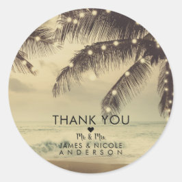 Vintage strand oceaans palmbomen en verlichte trou ronde sticker