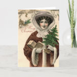 Vintage Victorian Lady Christmas Card Feestdagen Kaart<br><div class="desc">Beautiful Vintage image of a Victorian lady, out in the crisp, white snow doing some Holiday shopping and picking up her Christmas Tree, with the greeting MERRY CHRISTMAS. Interior says simply MERRY CHRISTMAS AND A HAPPY NEW YEAR. Inside left is blank for you to write a Christmas note to your...</div>