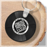 vinyl | Muzikant DJ | QR-code Sleutelhanger<br><div class="desc">Introductie van onze aanpasbare vinyl LP-stijl QR Code sleutelhanger - het perfecte accessoire voor de muziekprofessional! Deze sleutelhanger heeft een strakke vinyl LP-plaat in zwart-wit, samen met een QR-code die kan worden gekoppeld aan uw eigen muziek. Met onze "personaliseer"-functie kunt u uw eigen unieke QR-code genereren, waardoor potentiële klanten eenvoudig...</div>