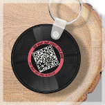 vinyl | Muzikant DJ | QR-code Sleutelhanger<br><div class="desc">Introductie van onze aanpasbare vinyl LP-stijl QR Code sleutelhanger - het perfecte accessoire voor de muziekprofessional! Deze sleutelhanger heeft een strakke vinyl LP-plaat in zwart en rood, samen met een QR-code die kan worden gekoppeld aan uw eigen muziek. Met onze "personaliseer"-functie kunt u uw eigen unieke QR-code genereren, waardoor potentiële...</div>