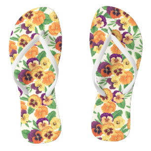 Violas op licht crèmekleurig teenslippers