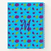 Violet en groene bladeren blauwe achtergrond monog notitieboek (Achterkant)