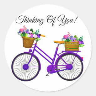 Violet fiets met mand bloemen ronde sticker