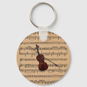 Violin met achtergrond voor vel muziek sleutelhanger