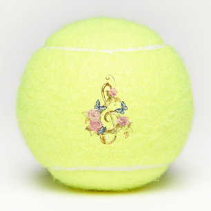 Vioolsleutel met roze rozen tennisballen