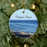 Virginia Beach Keramisch Ornament<br><div class="desc">This round porcelain ornament features a beachfront image of Virginia Beach, Virginia. De huur is written across the top of the image; on the reverse over a light blue background is a fun detail - the geo coordinates. Contact me through Zazzle if you have issues about this ornament or would...</div>
