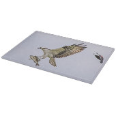 Visarend die door een rode gevleugelde merel snijplank (Hoek)