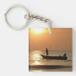 Vissende boot op zonsondergang sleutelhanger
