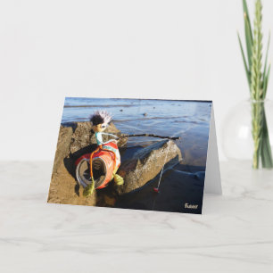 Vissende Fubby op een blikje aan de waterkant. Bedankkaart