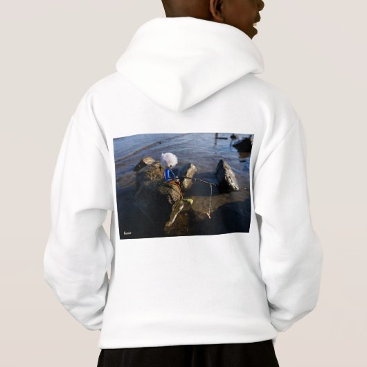 Vissende Fubby op een steen. (Achterkant)