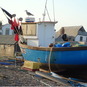vissersboot bemand door de kustfoto van het zee legpuzzel
