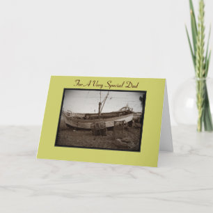 vissersboot met kreeftenpotten op het strand voor  kaart