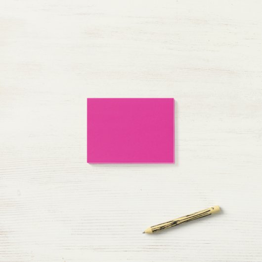Vivid roze vaste kleur post-it® notes (Op bureau)