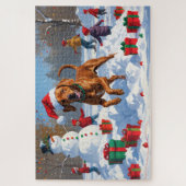 Vizsla hardlopend in de sneeuw met kerstmuts legpuzzel (Verticaal)