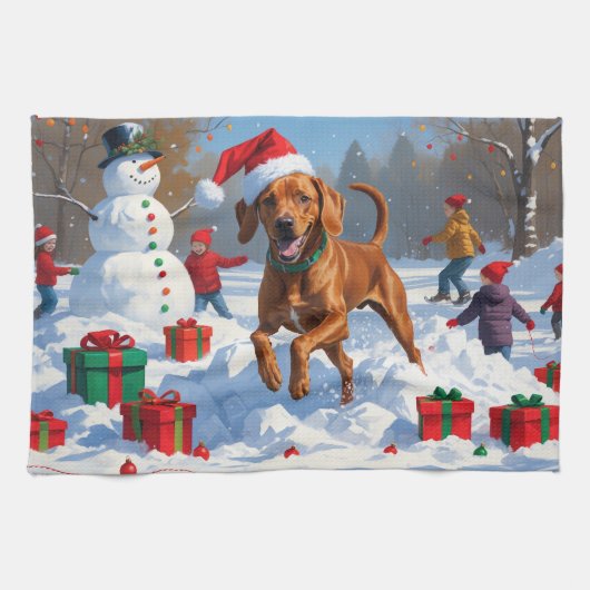 Vizsla hardlopend in de sneeuw met kerstmuts theedoek (Horizontaal)