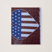 Vlag in hartvorm, geschilderd op schuur na 9-11. legpuzzel (Verticaal)