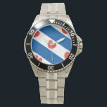 Vlag van Friesland Horloge<br><div class="desc">De vlag van Friesland,  een provincie in Nederland. Het bestaat uit blauwe en witte diagonale strepen; in de witte strepen zijn rode pompblêden,  bladeren van de gele waterlelie die één van de harten kunnen herinneren,  maar volgens de officiële instructies "mogen niet hartvormig zijn".</div>