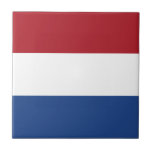 Vlag van Nederland Tegeltje<br><div class="desc">Vlag van Nederland: "Ik zal doorgaan". Het bestaat uit drie horizontale banden: rood,  wit en blauw.</div>