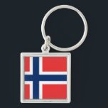 Vlag van Noorwegen Sleutelhanger<br><div class="desc">De vlag van Noorwegen is rood met een indigo blauw Scandinavisch kruis dat in het wit is geschetst en zich uitstrekt tot de randen van de vlag; het verticale gedeelte van het kruisje wordt verschoven naar de hijskant in de stijl van de Dannebrog,  de vlag van Denemarken.</div>