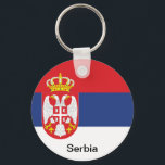 Vlag van Servië Sleutelhanger<br><div class="desc">De vlag van Servië is een driehoekig die bestaat uit drie gelijke horizontale banden, rood bovenaan, blauw in het midden en wit onderaan. Dezelfde drieluik, in sommige variaties, was de vlag van Servië in zijn hele geschiedenis, en is de etnische vlag van het Servische volk. De huidige vorm van de...</div>