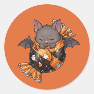 Vleermuis gewikkeld in Halloween Snoep Ronde Sticker